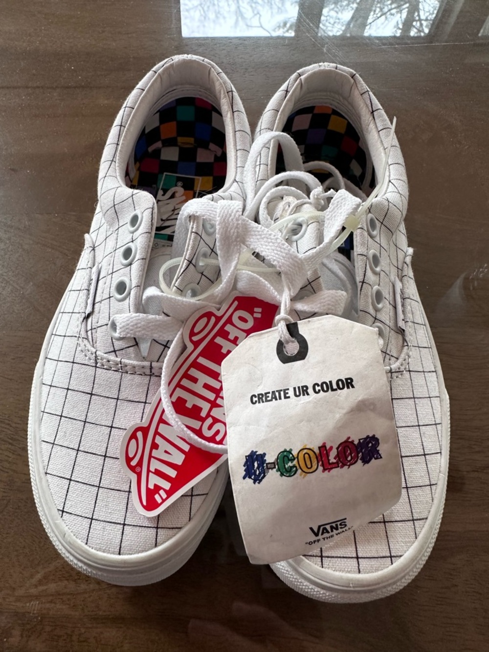 Vans Kids White Canvas Sneakers with Black Grid and Colorful Checker Lining